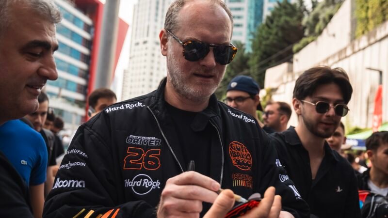 Maximillion Cooper with Gumball 3000 hypercars in Istanbul at the Cars on Sundays event, featuring Ferrari, Lamborghini, and Mercedes supercars.